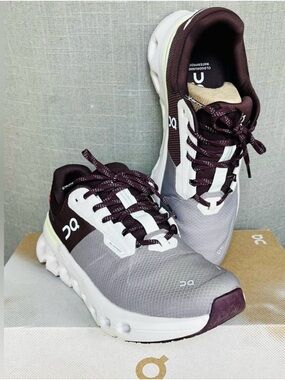 On Running Women's Sneakers in Gray and Dark Plum.